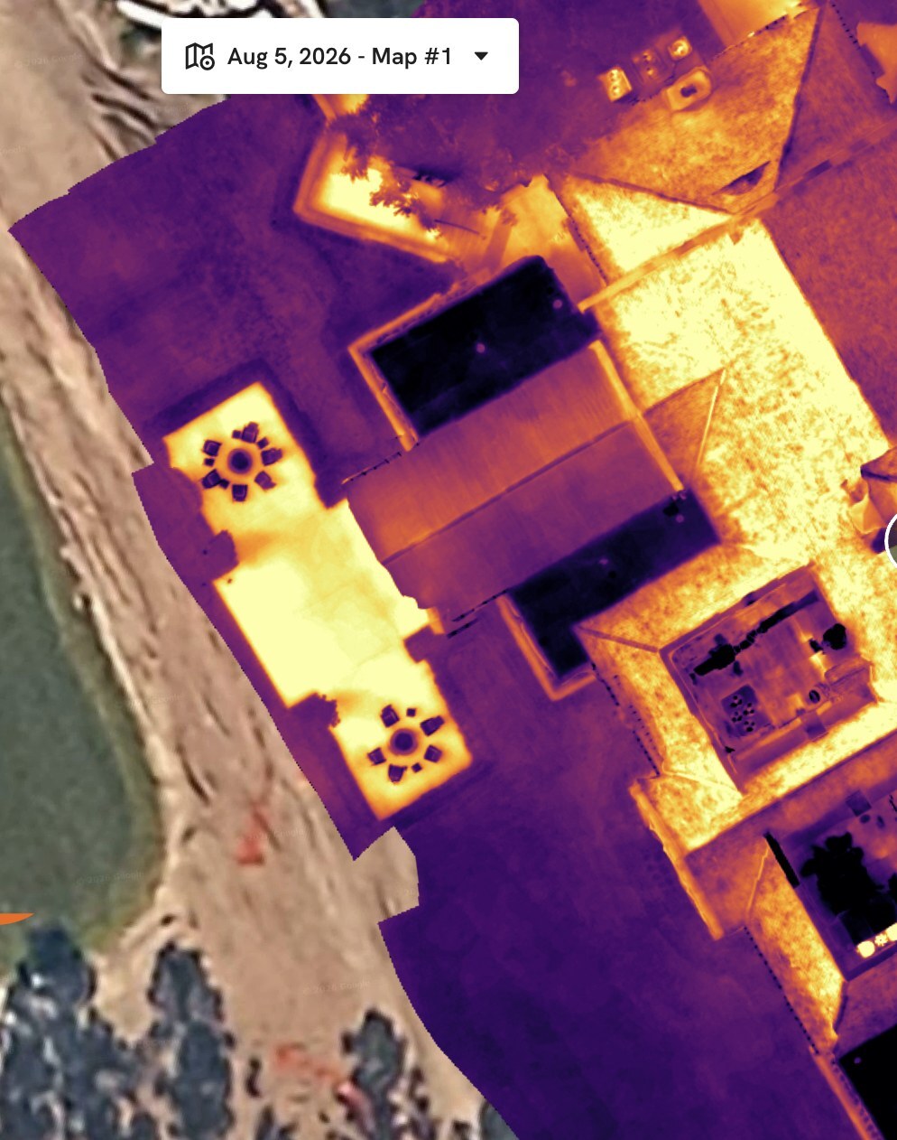 Georeferenced thermal orthomosaic of the same roof, with temperature differentials mapped across the full surface.